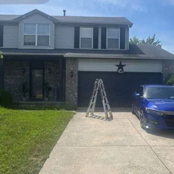 Before: Two-story roof replacement