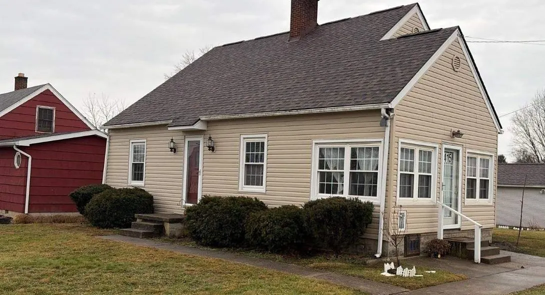 Cape Cod home in Central Ohio with a new roof and siding by Lifetime Roofing