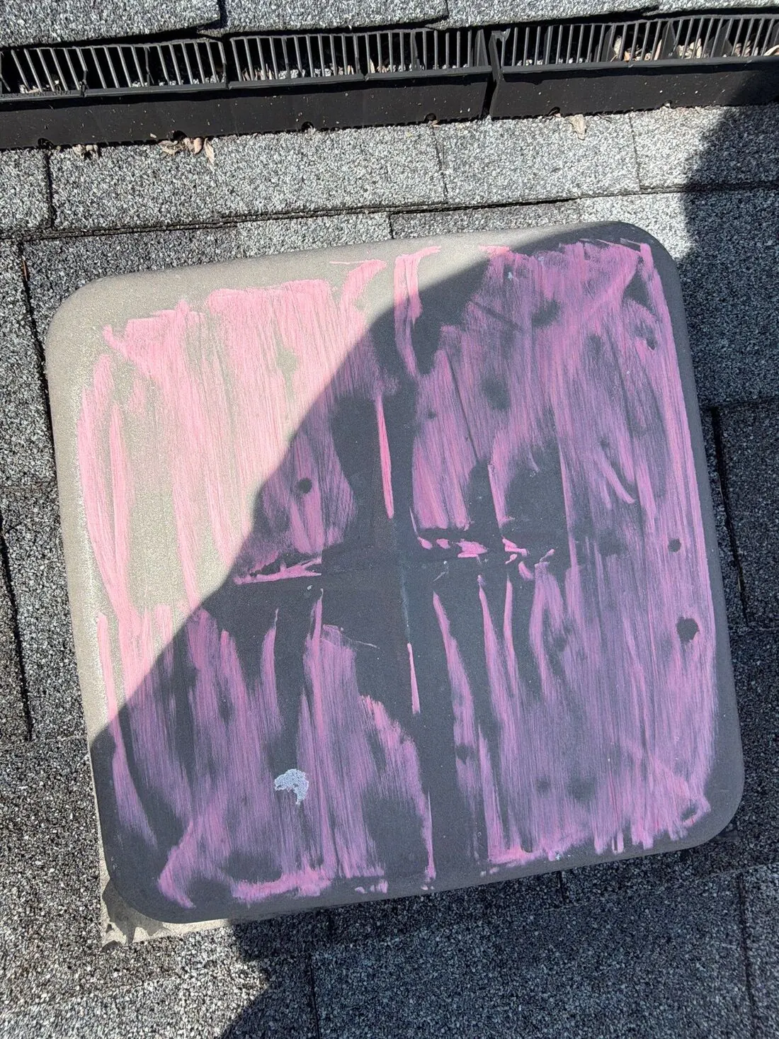 Roof vents: Hail dents on a box vent, highlighted with chalk