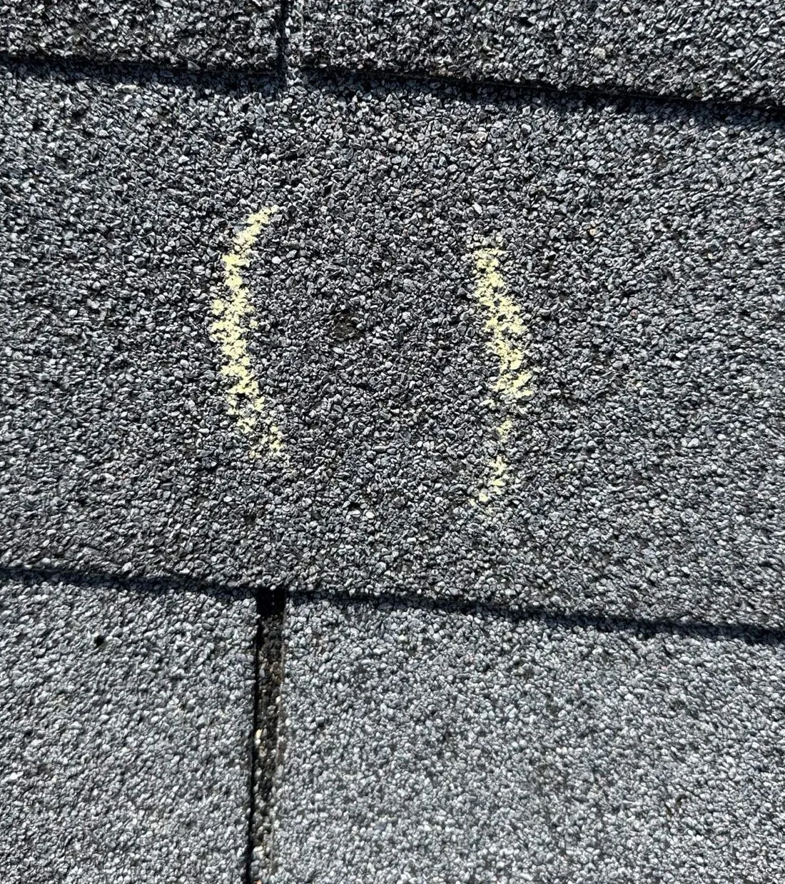 Shingles · Hail: A bruise marked for the adjuster